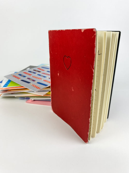 The original "Loved" journal, after almost 10 years. One journal with all of the love in one place, replacing stacks of individual greeting cards.
